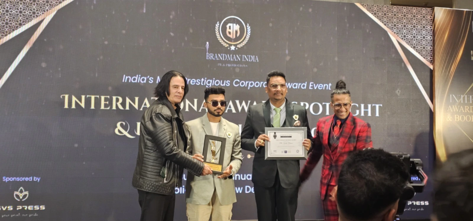 Suzu Travels team receiving a travel industry award