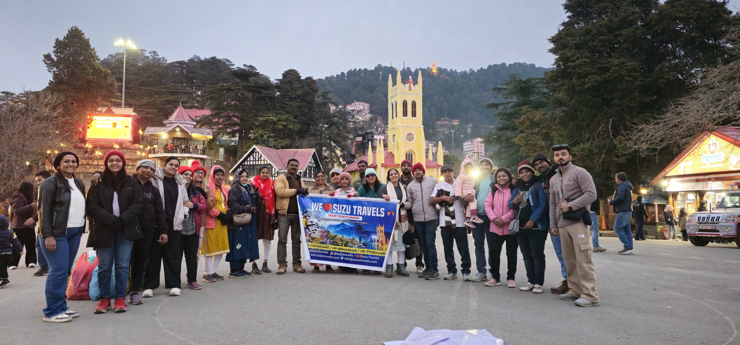 a group of people posing for a photo