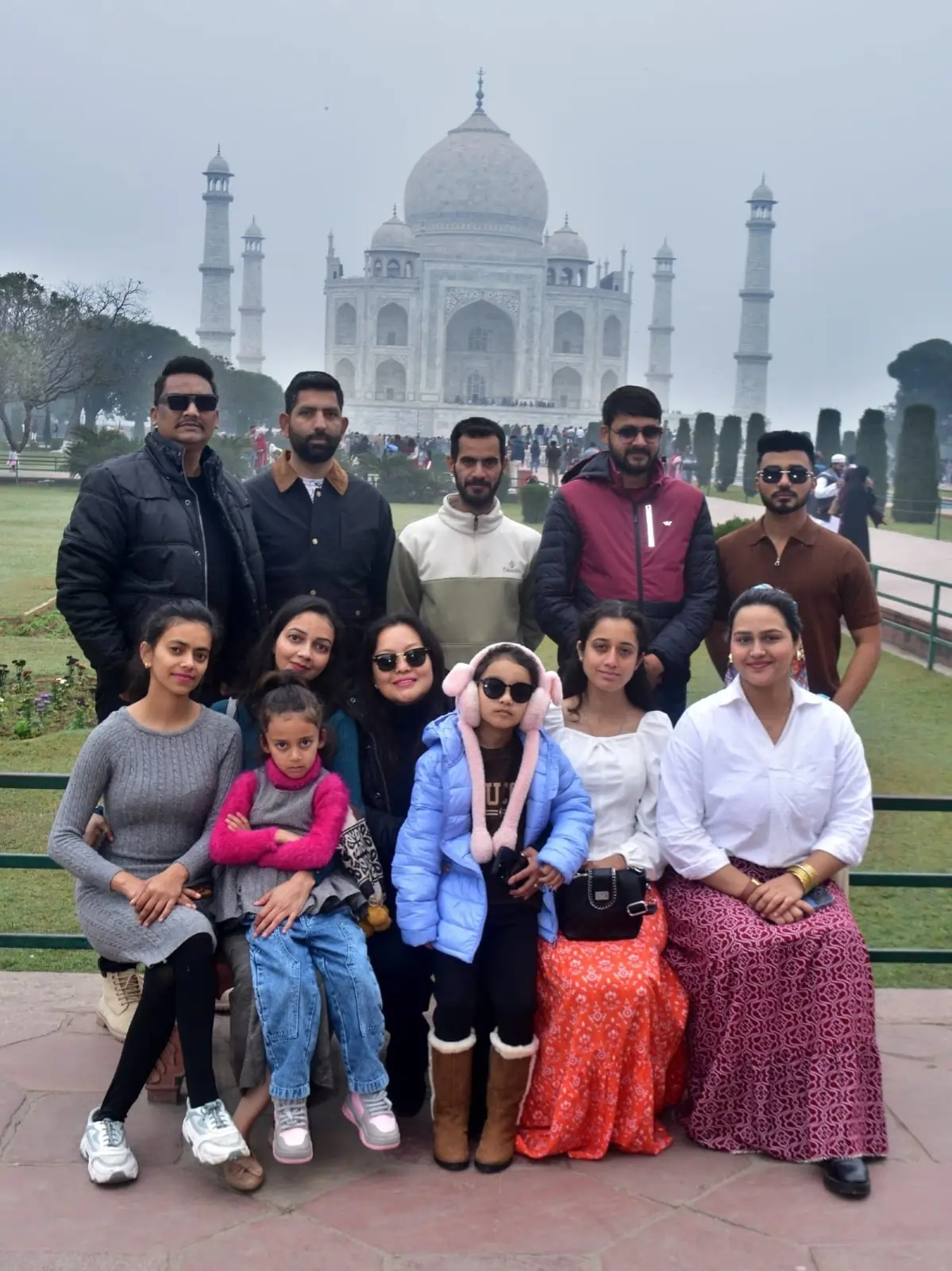 Suzu Travels team members assisting travelers