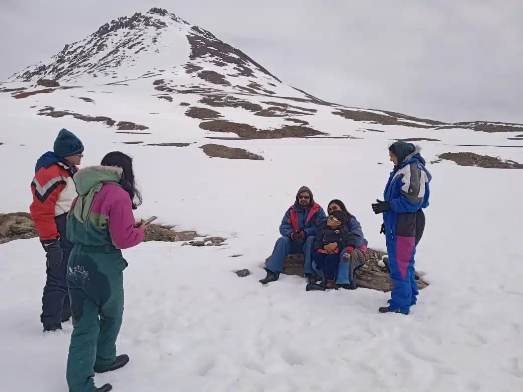 Suzu Travels guests playing in the snow at Manali