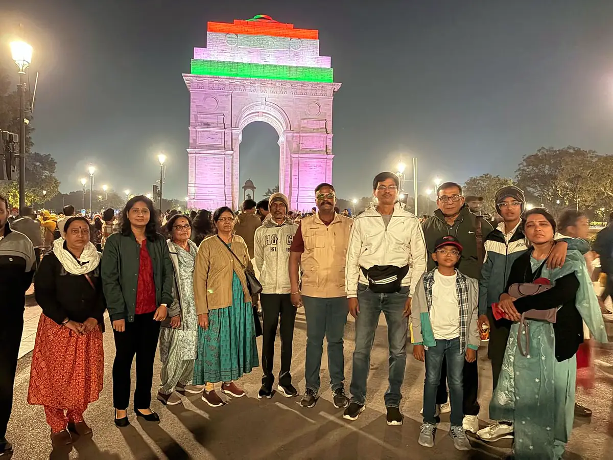 Suzu Travels group at India Gate, New Delhi, at night