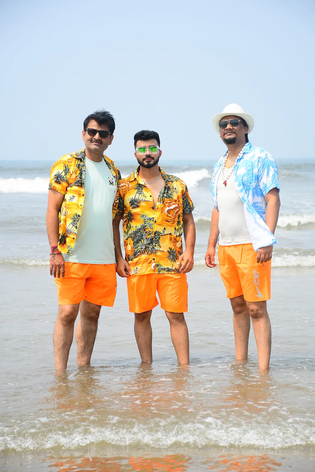 Friends on a Suzu Travels group trip enjoying a Goa beach