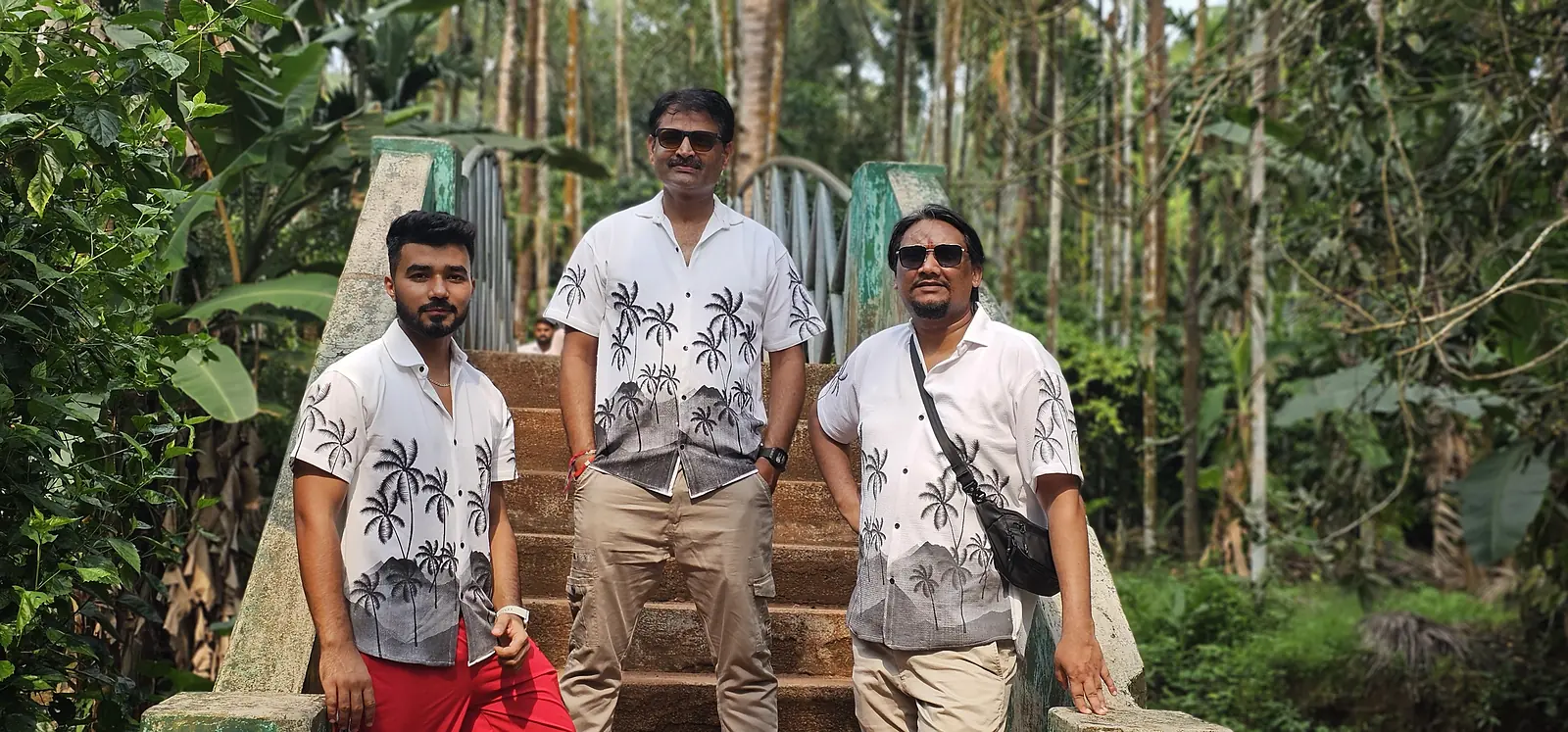 Suzu Travels group in a palm grove in Goa