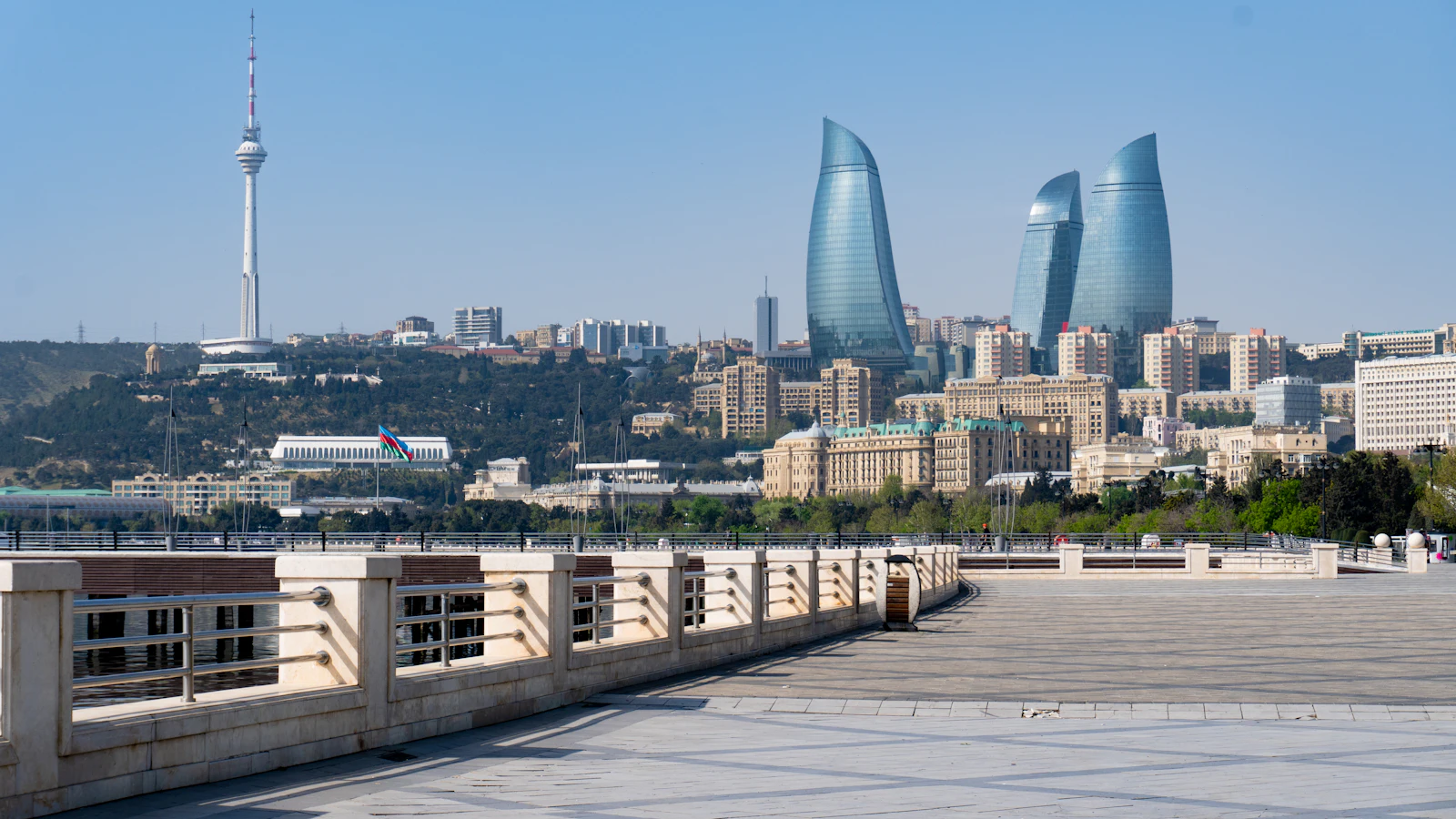 Seafront promenade in Baku with the Flame Towers and Baku TV Tower on the skyline, Azerbaijan