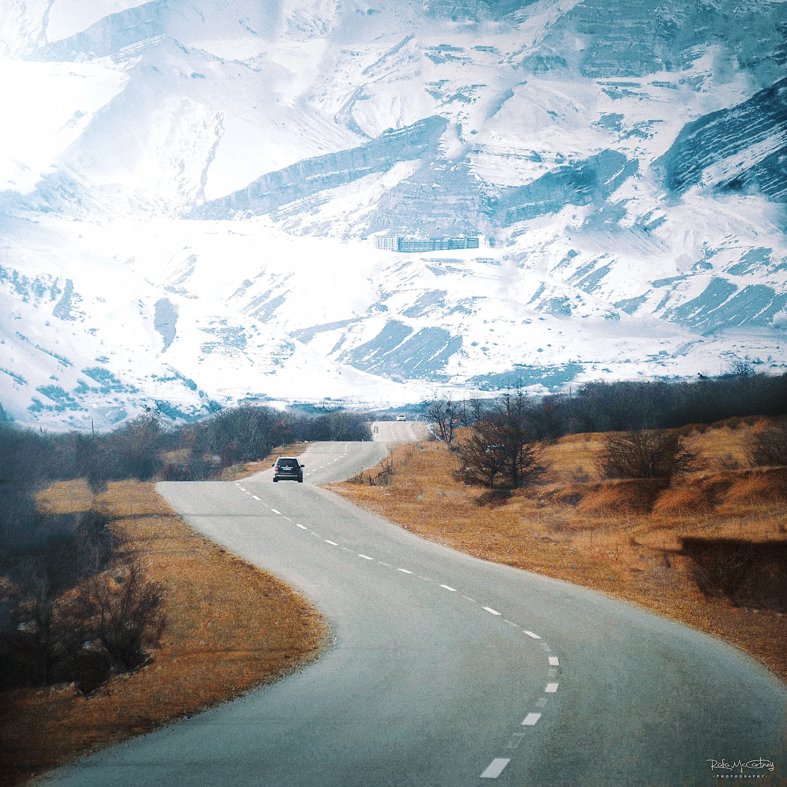 suzu abroad azerbaijan qusar shahdag mountain road Mountain road through snowy hills towards Shahdag in the Qusar region, Azerbaijan