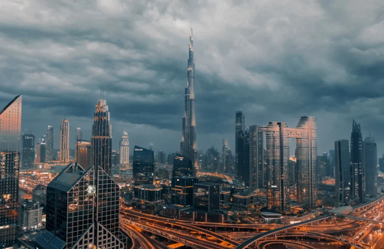 suzu abroad dubai Dubai skyline with the Burj Khalifa under a cloudy sky