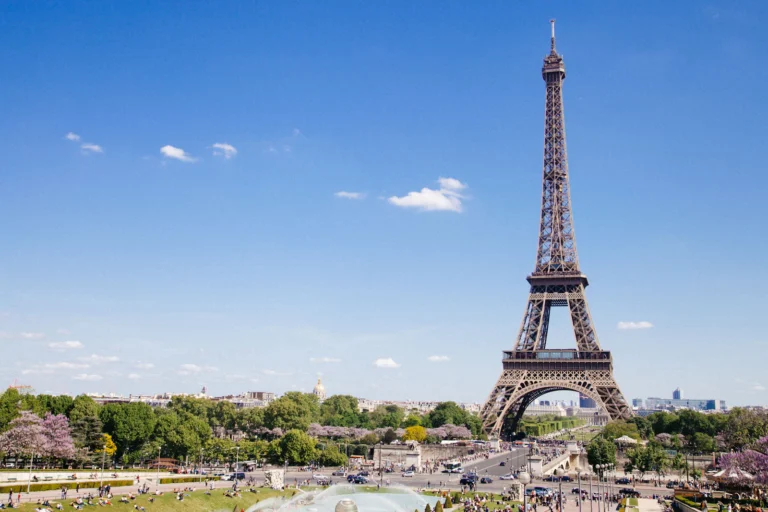 suzu abroad europe Eiffel Tower under a blue sky, Paris