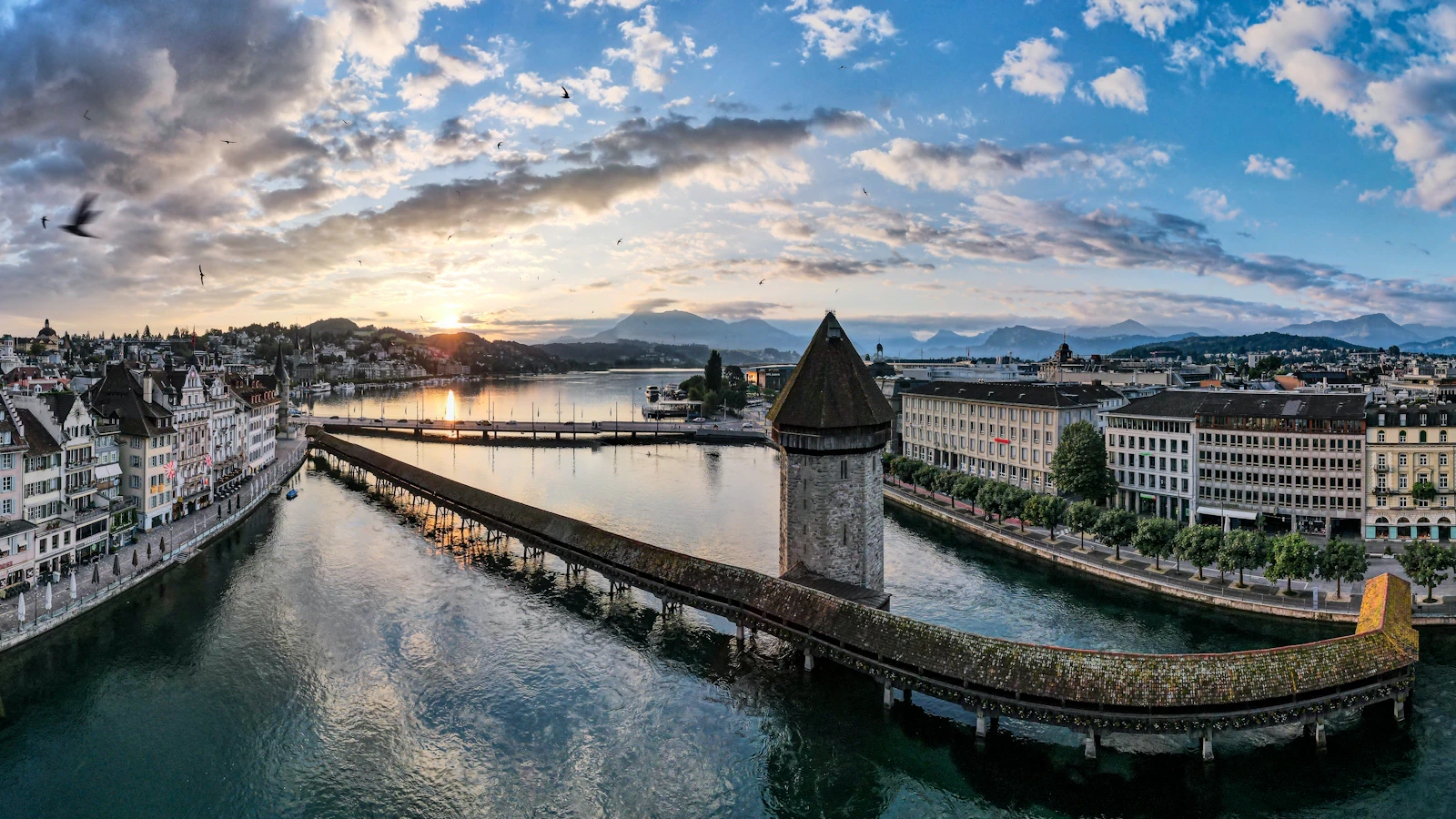suzu abroad europe lucerne chapel bridge Chapel Bridge and the Water Tower on the Reuss River at sunrise, Lucerne, Switzerland