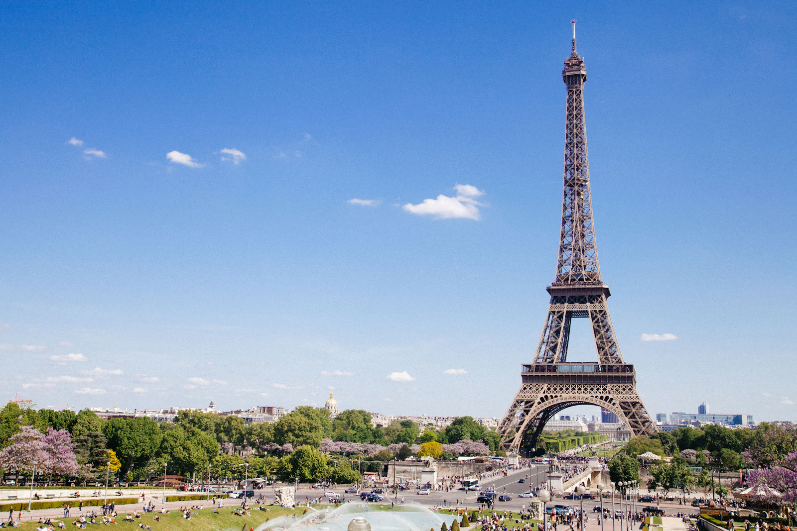 suzu abroad europe Eiffel Tower under a blue sky, Paris