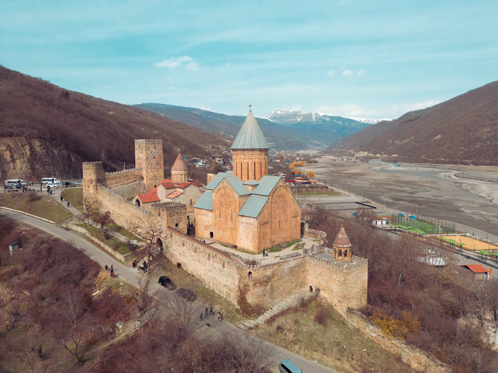 suzu abroad georgia ananuri fortress aerial Aerial view of Ananuri fortress with its church and stone walls in a mountain valley, Georgia