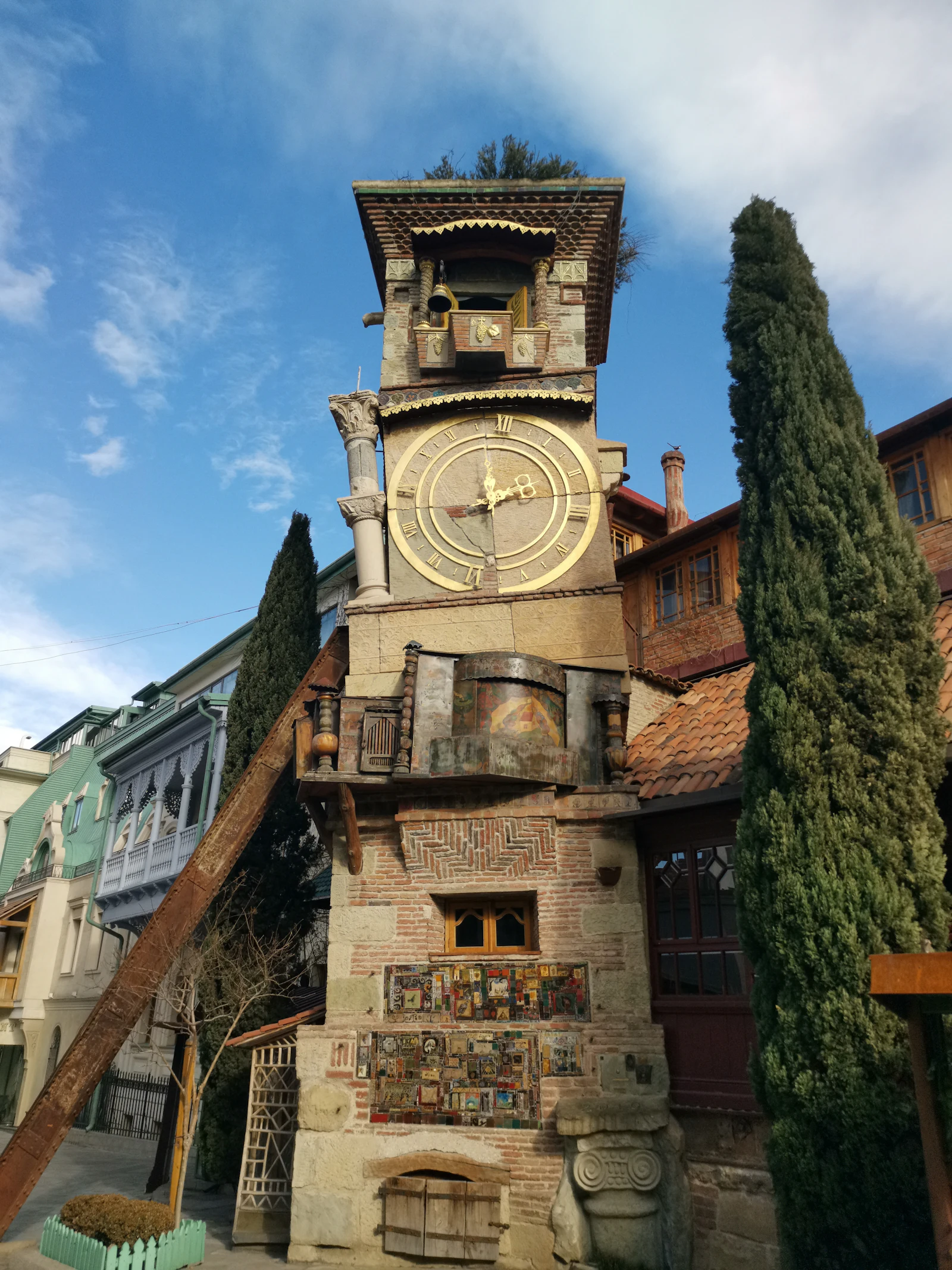 suzu abroad georgia tbilisi gabriadze clock tower The leaning Gabriadze clock tower beside the marionette theatre in Tbilisi old town, Georgia
