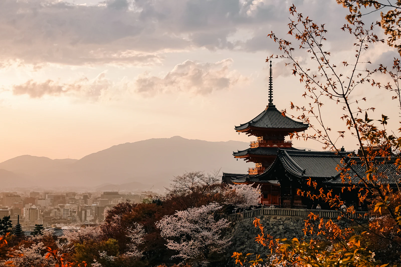 suzu abroad japan kiyomizu dera pagoda Pagoda at Kiyomizu-dera at sunset with blossom and autumn leaves, Kyoto, Japan