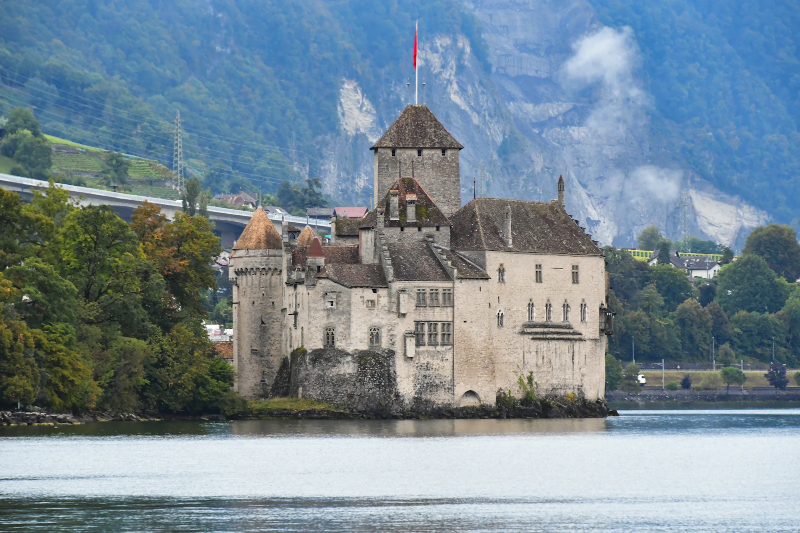 suzu abroad switzerland chillon castle Chillon Castle on the shore of Lake Geneva with mountains behind, near Montreux, Switzerland