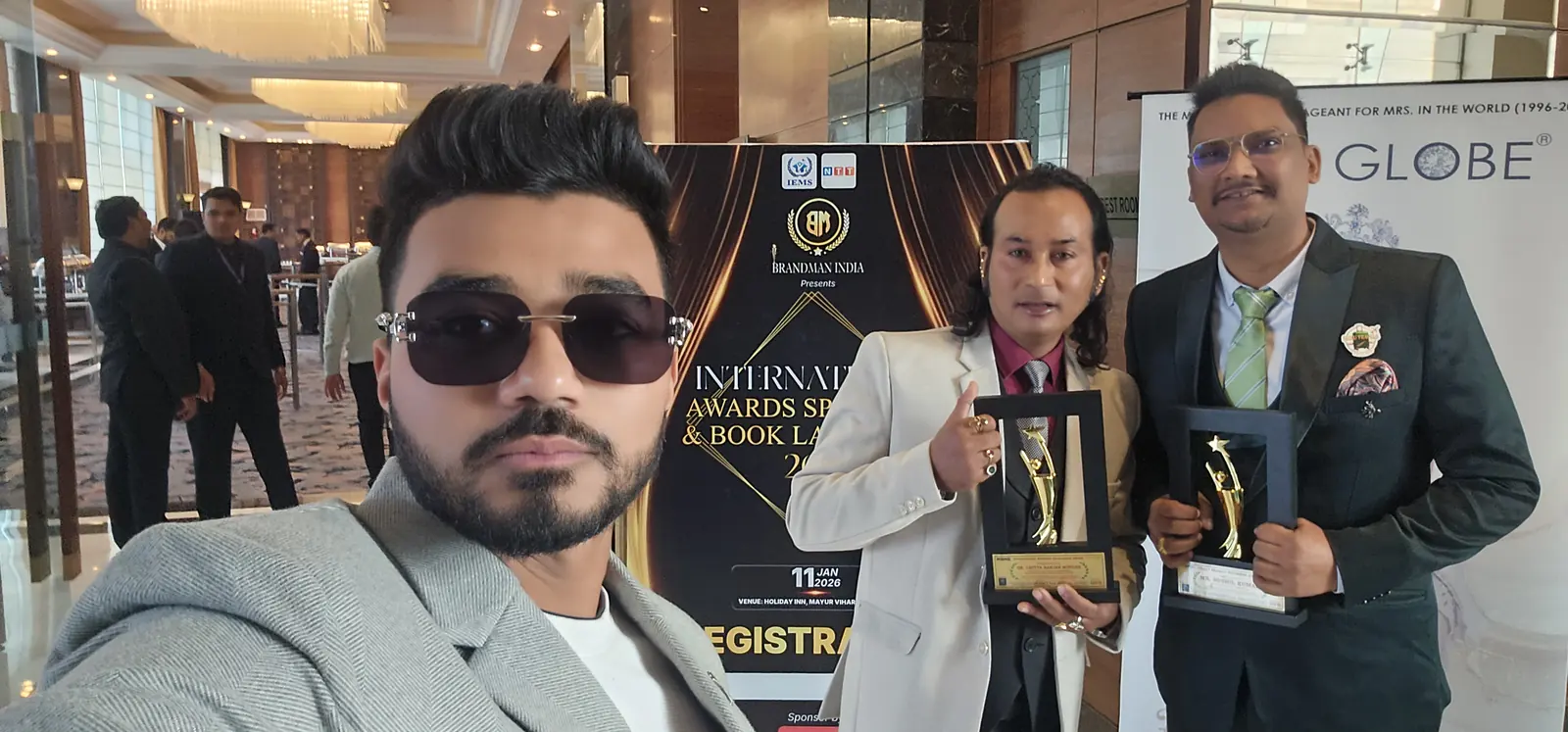 suzu travels team award winners 2026 Suzu Travels team with trophies at the 2026 awards